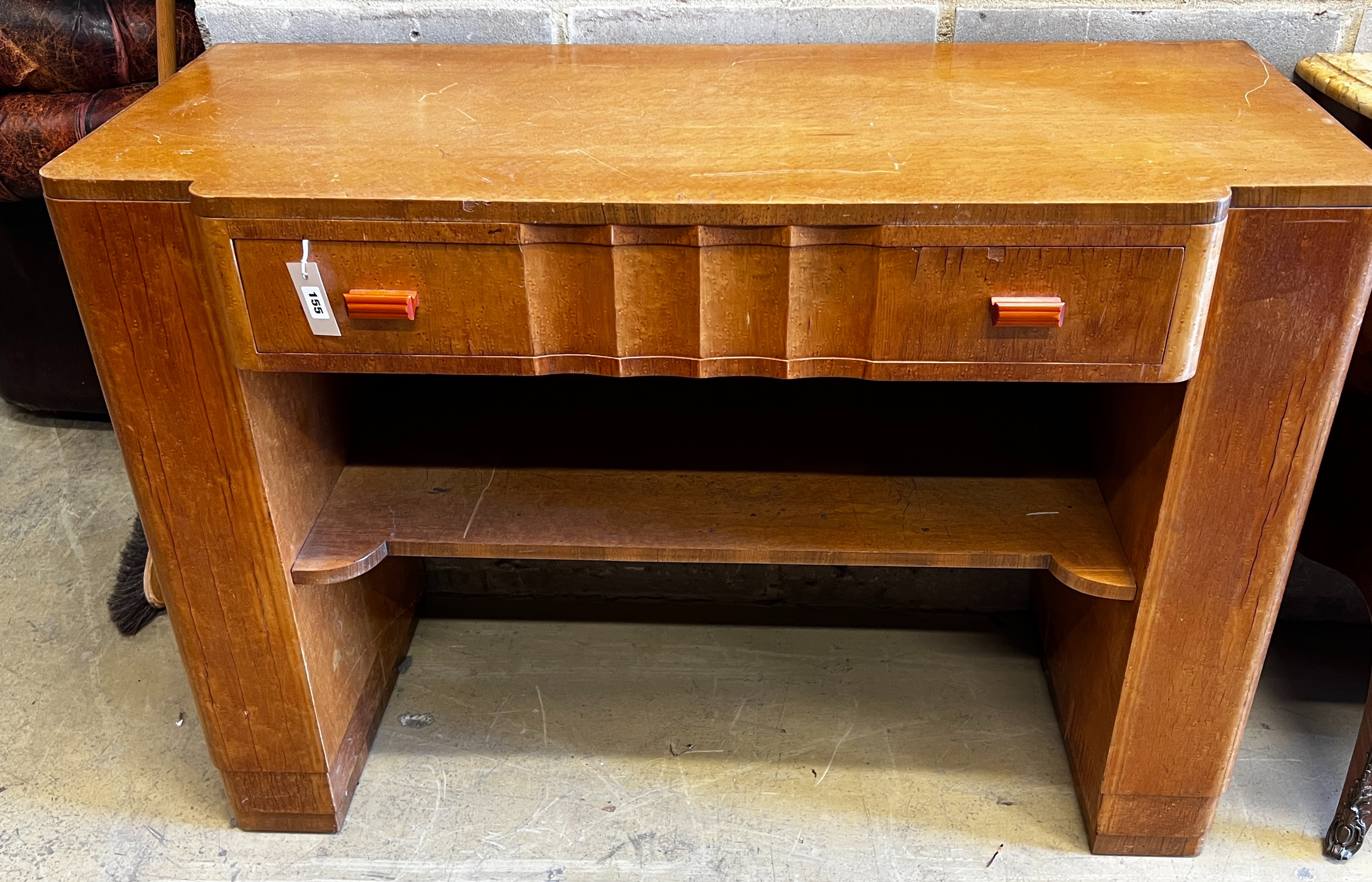 An Art Deco birds eye maple side cabinet.